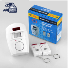 Load image into Gallery viewer, 2 Remote Controller Wireless Home Security PIR Alert Infrared Sensor Alarm system Anti-theft Motion Detector Alarm 105DB Siren This remote control infrared alarm is a set of infrared detectors and alarms in one, with wireless remote control and power supply to form an alarm system.  Sedmeca Express. Personal Protective Equipment.
